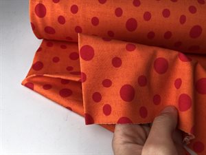 Bomuldsjersey - smuk orange med asymmetriske prikker